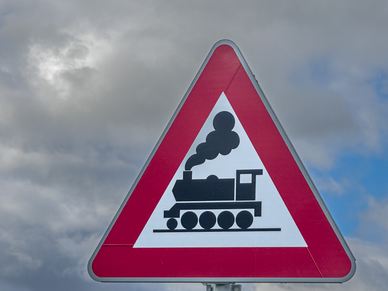 Dampflok auf dem Bahn&uuml;bergangsschild, bei uns werden sie leider durch eine moderne Lok ausgetauscht